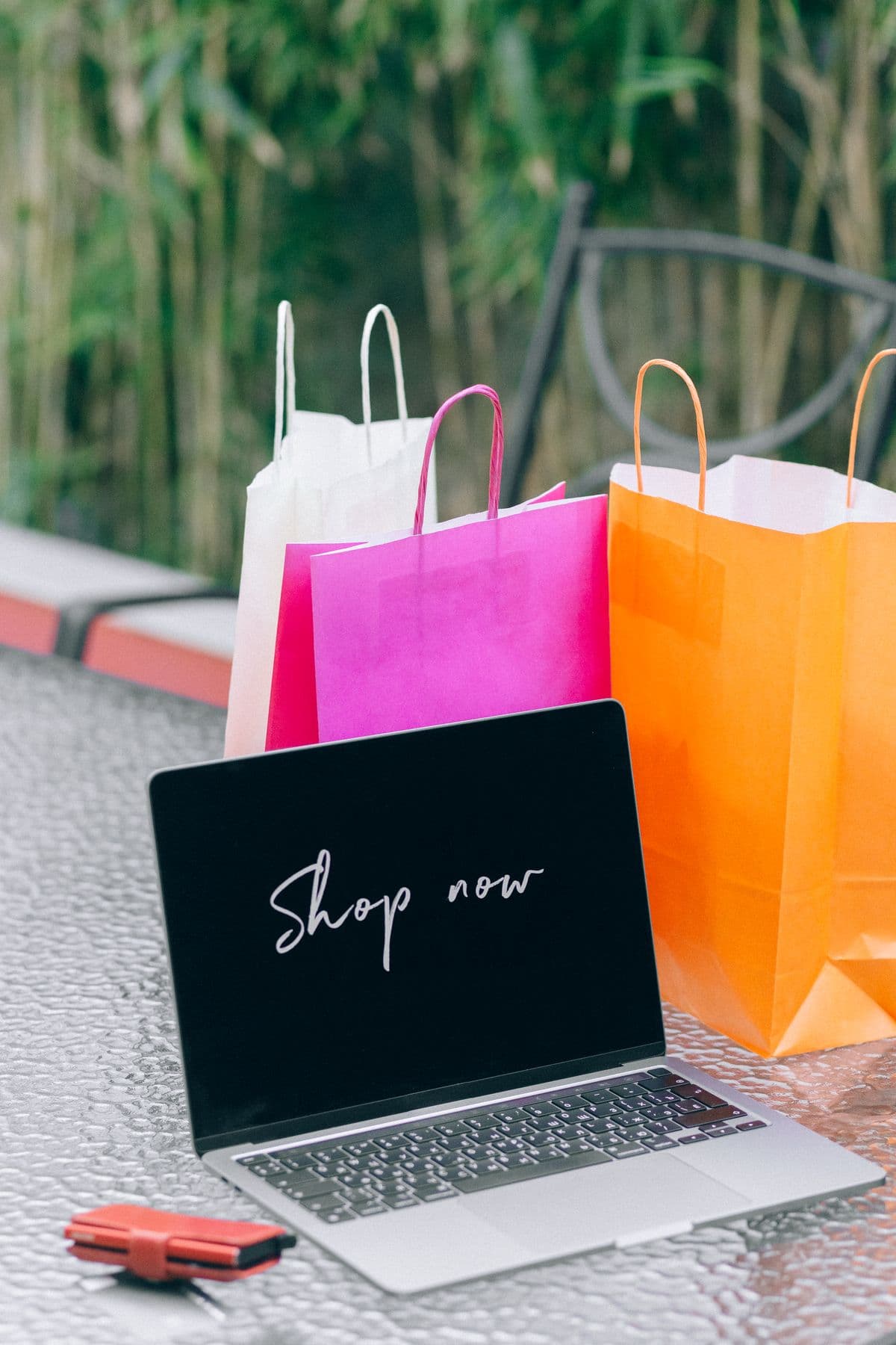 A laptop showing a 'Shop now' storefront ready to go live